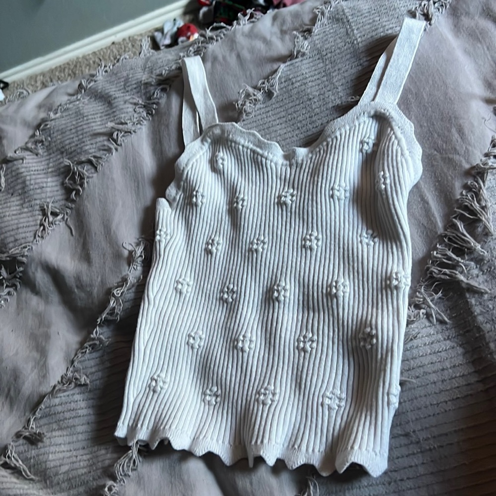 Ribbed white tank top with flowered sewn in